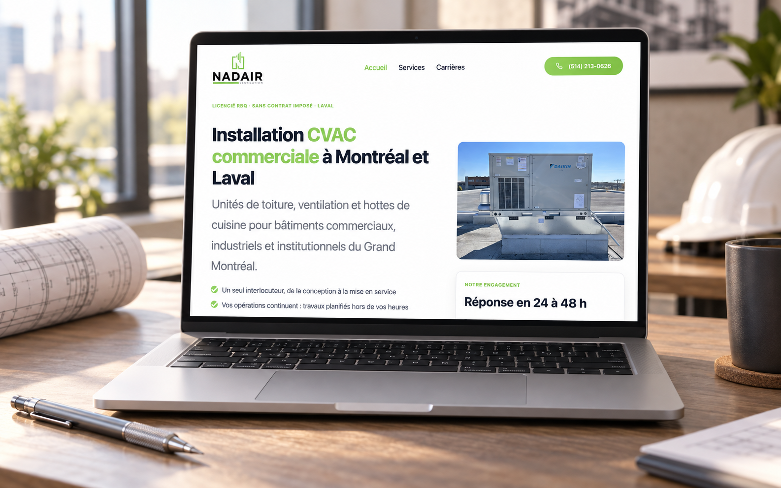 The Nadair Ventilation public website shown on a laptop beside project plans